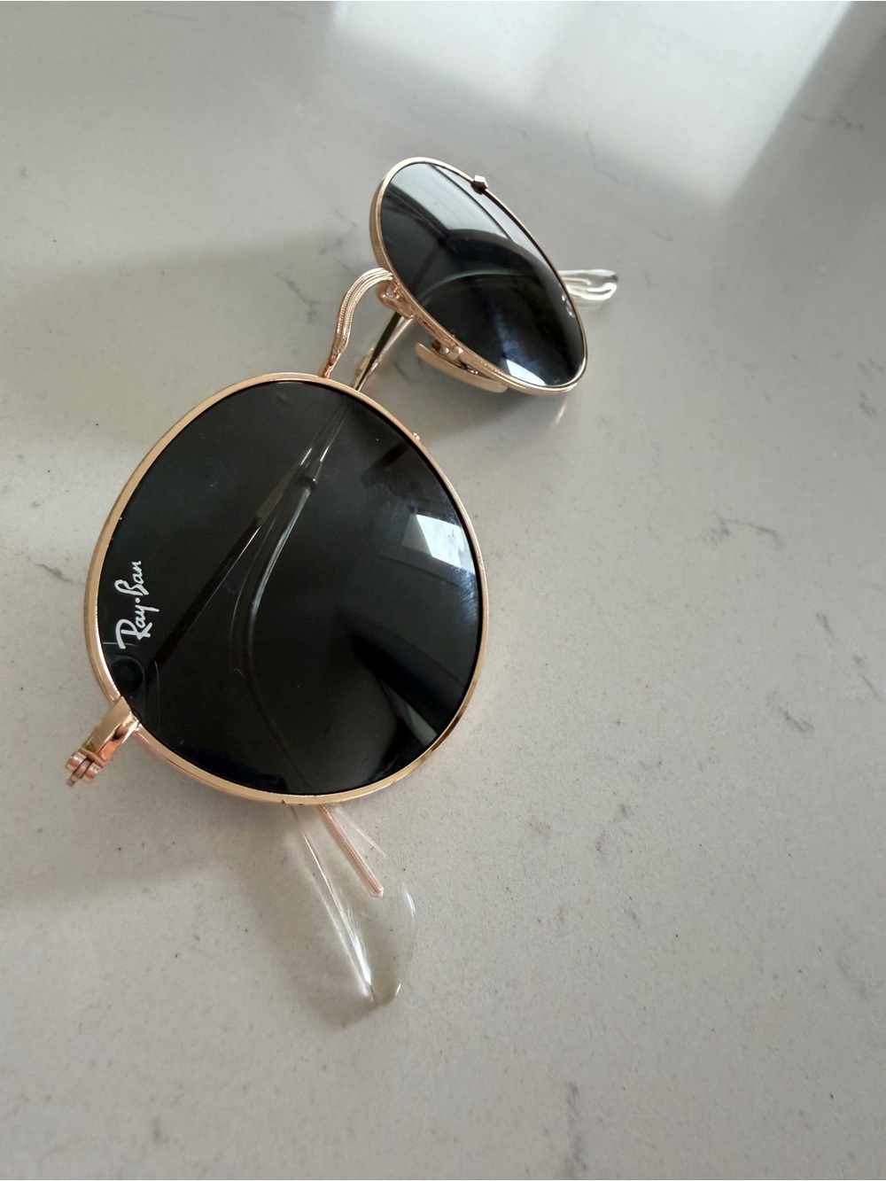 Round RayBan Metal Frame Sunglasses in Gold with Black Lenses